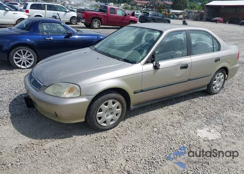 2000 Honda Civic Lx z USA, uszkodzony, nr VIN 1HGEJ6574YL031890